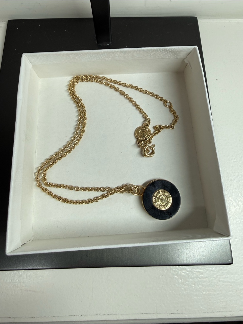 Marc Jacobs Gold Plated Black Enamel Circle
Logo Pendant Necklace